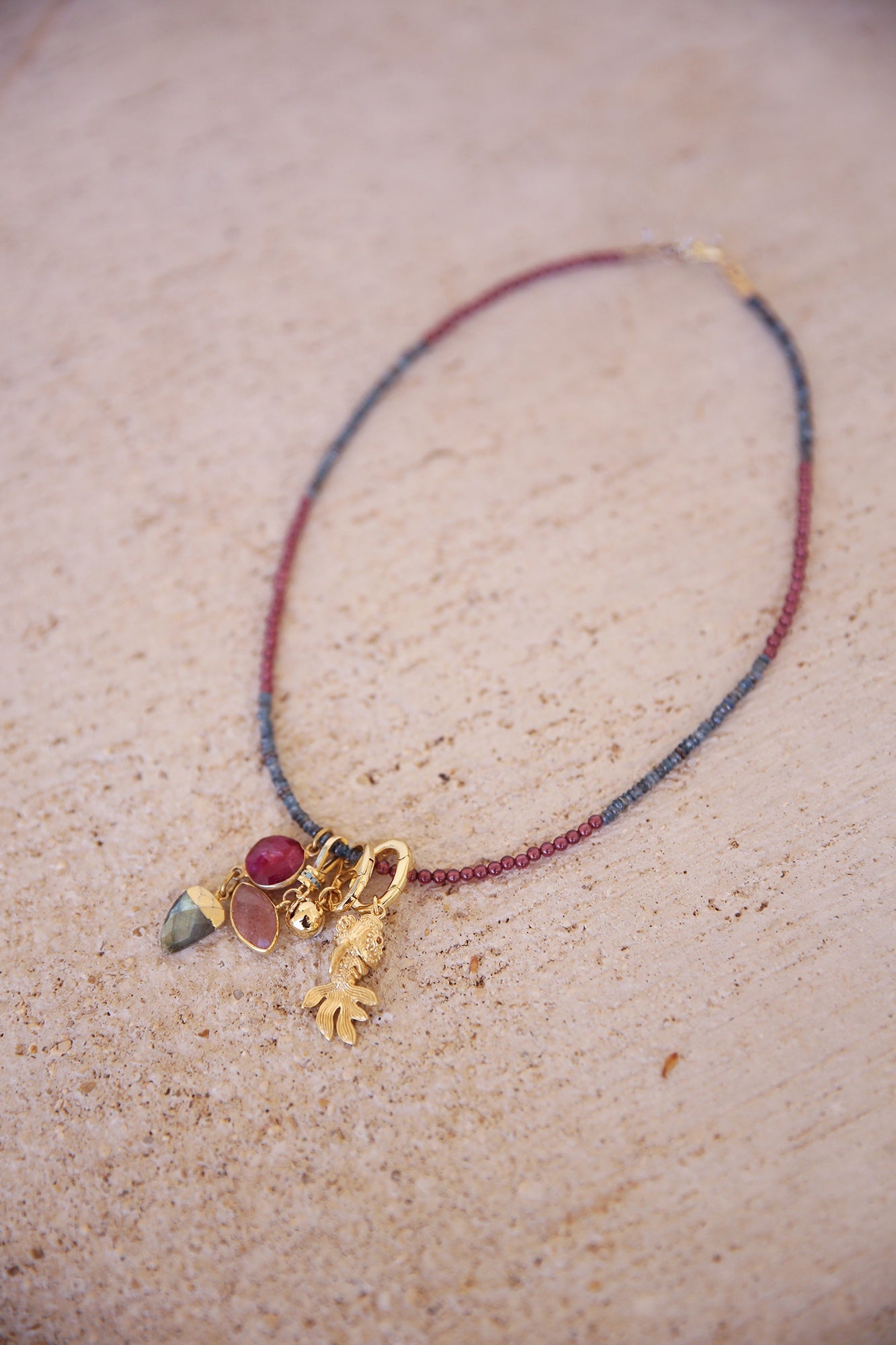 Necklace of Purple Garnet + Kyanite w/ 4 charms, inc. Ruby, Strawberry Quartz, Labradorite. Brass + 18K Gold Plated Findings