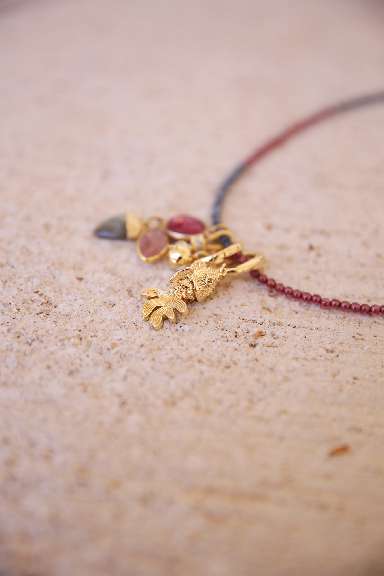 Necklace of Purple Garnet + Kyanite w/ 4 charms, inc. Ruby, Strawberry Quartz, Labradorite. Brass + 18K Gold Plated Findings