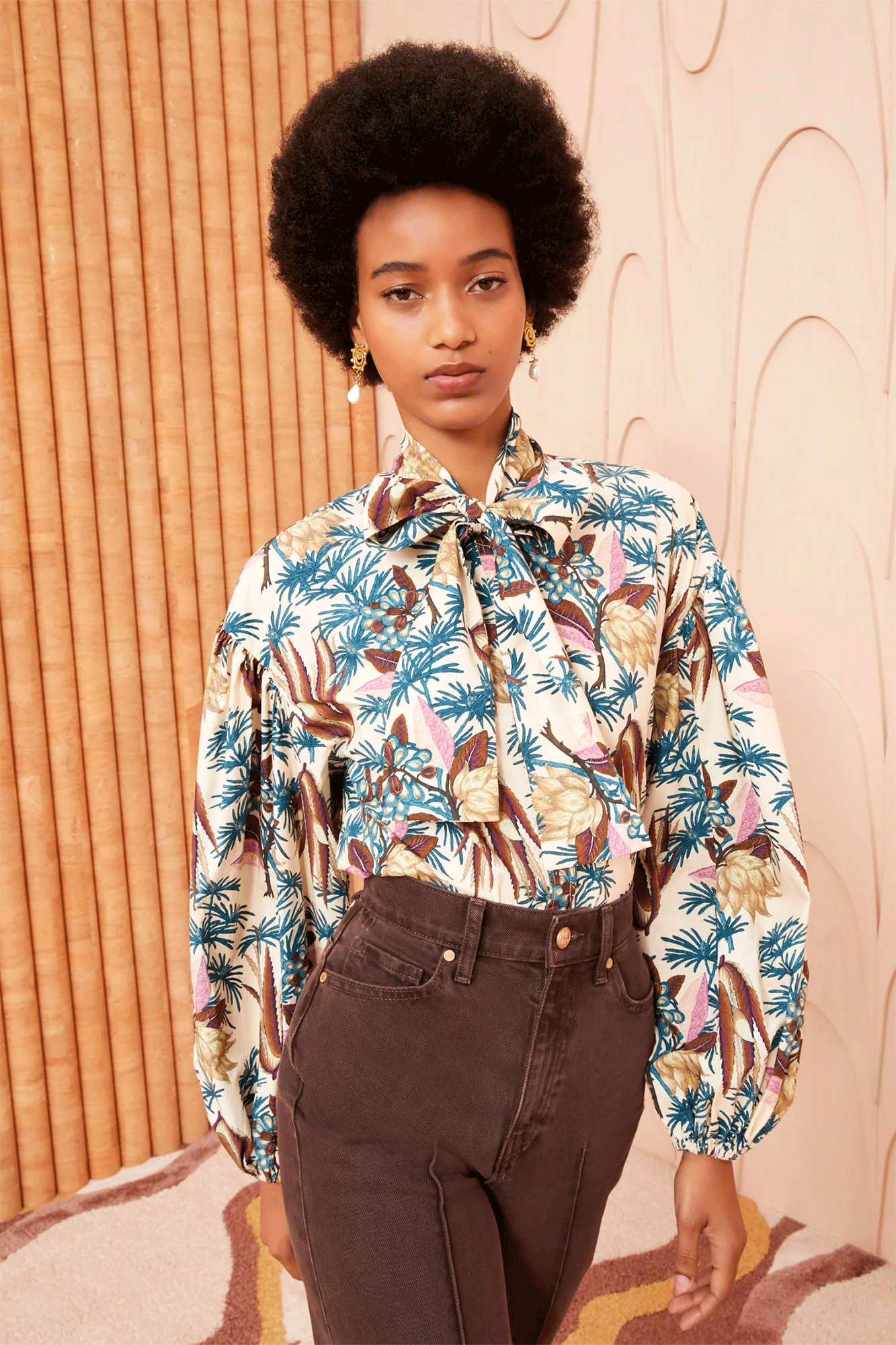 The Alberta Blouse from Ulla Johnson is an elegant addition to any wardrobe. Crafted from cotton poplin in an 18th century botanical-inspired print, this cream-based multi-colored blouse features neckties, voluminous long sleeves, and a button placket for a timeless touch. Make a statement with this beautiful piece.