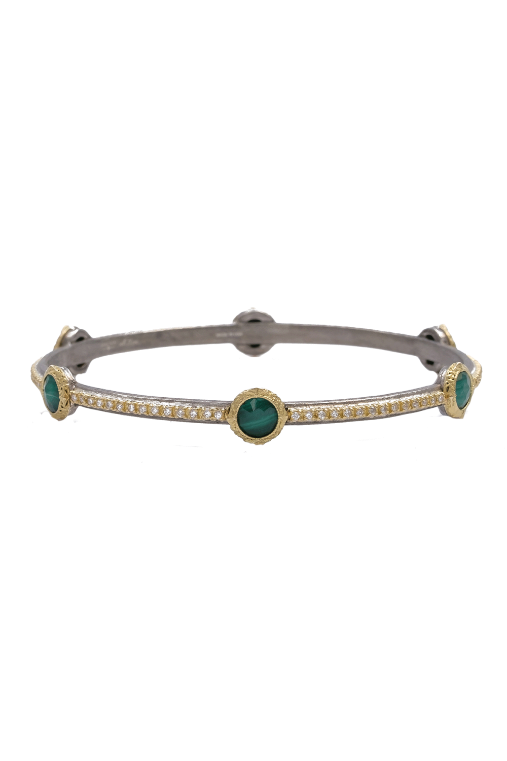 This 18k Yellow Gold Old World Bangle from Armenta is a luxurious timeless piece that brings together classic and modern elements.